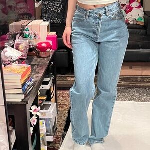 fashion nova medium wash crossover jeans
